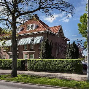 https://de-schiedamse-suite.amsterdamhotelsnl.com